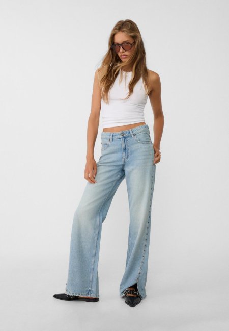 Low-rise studded straight-leg jeans