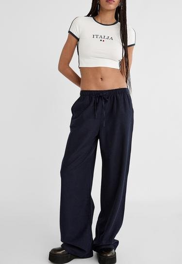 Loose-fitting linen blend trousers