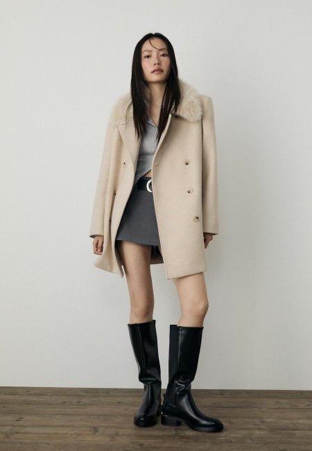 Coat with faux fur collar