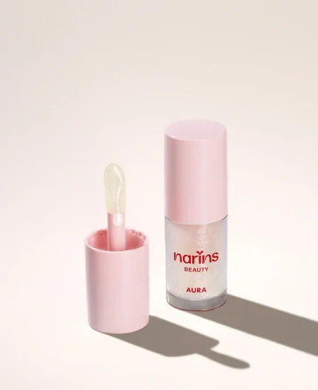 AURA Cooling Lip Gloss. Powered by the GlossGlow Complex